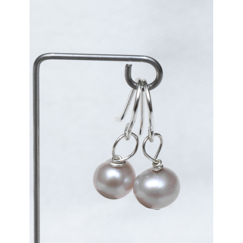 Ein guter Fang: Süßwasserperle am Fischhaken